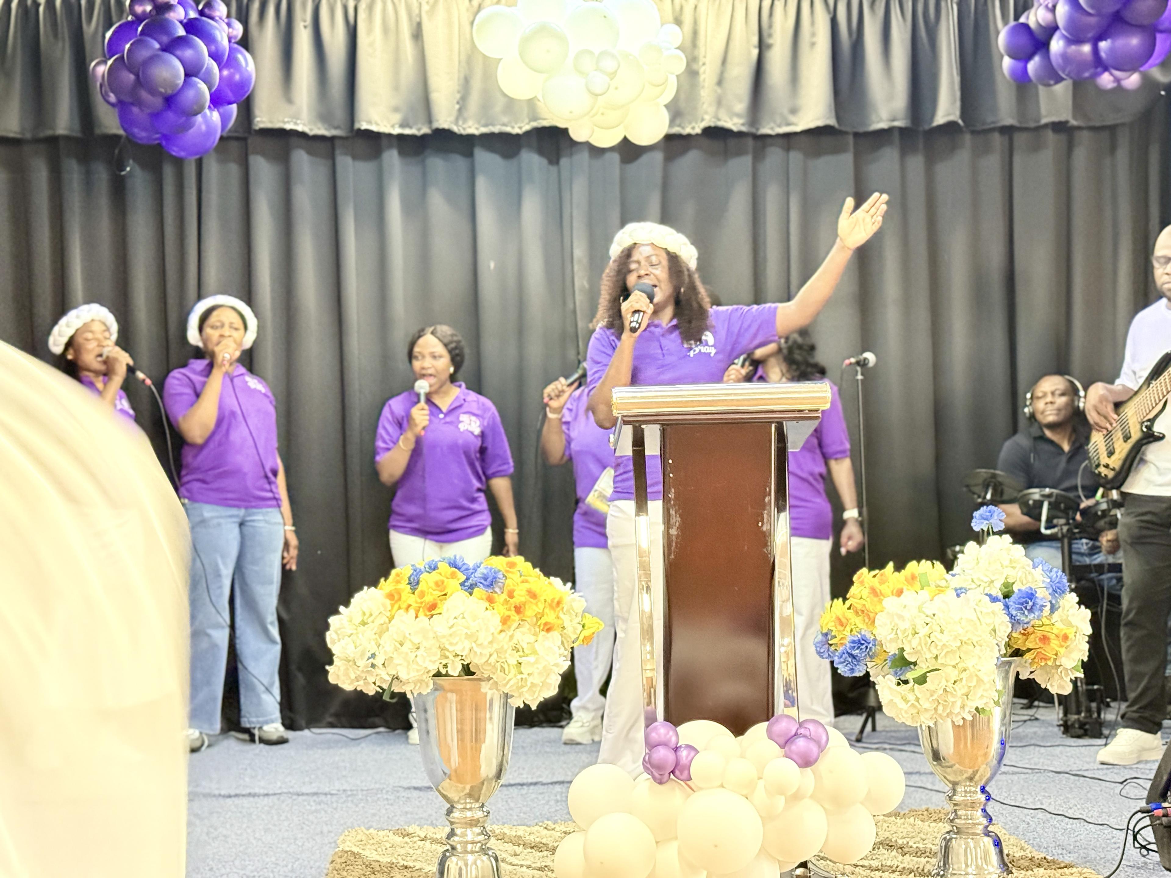 IOWCP women in prayer and worship together
