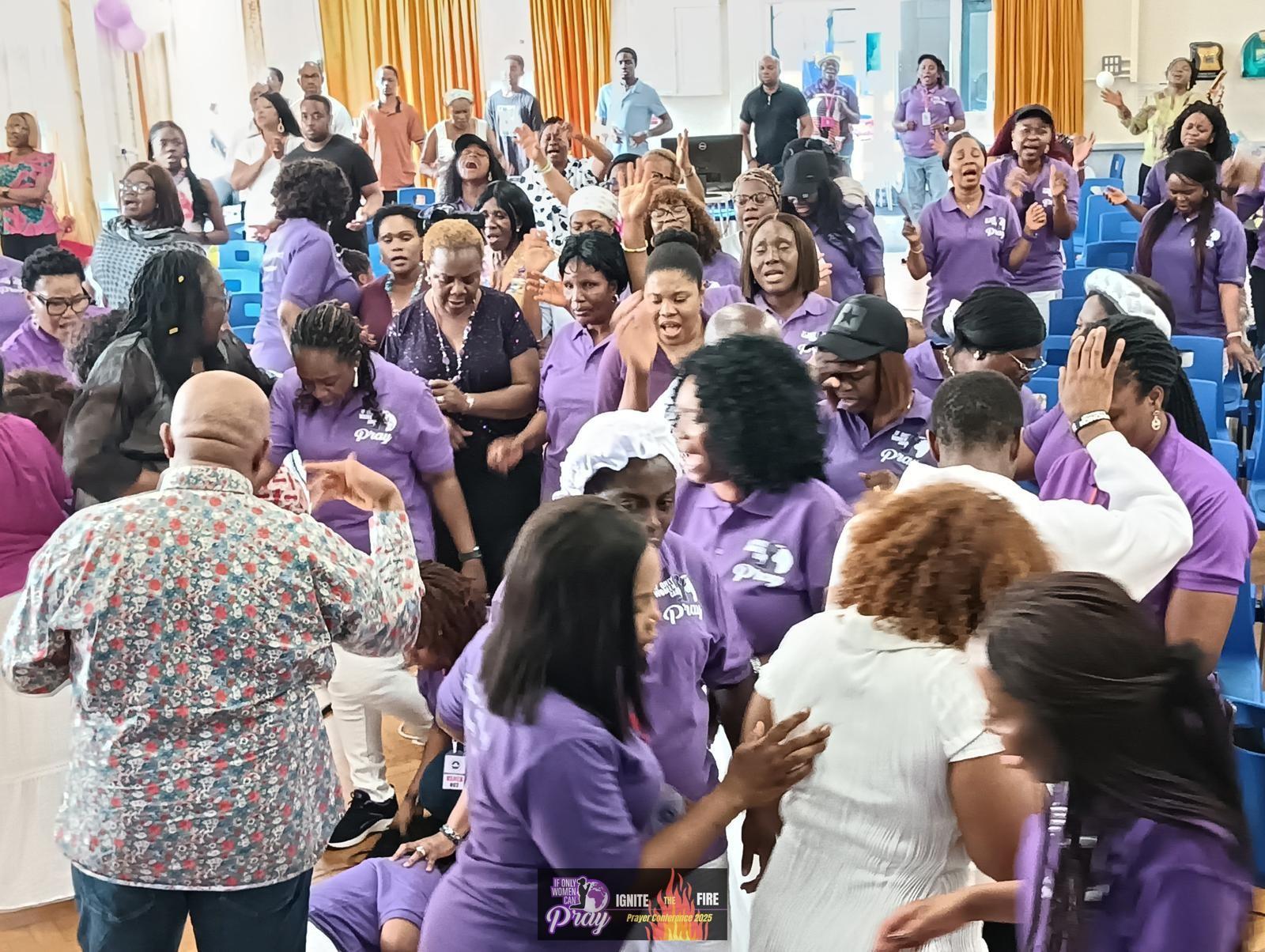 IOWCP women in prayer and worship together
